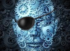 GCA blue gears comprising a face with an eye patch