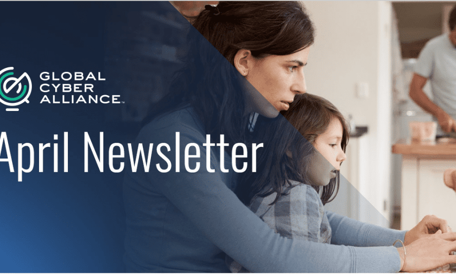 GCA April Newsletter woman working from home with child on her lap