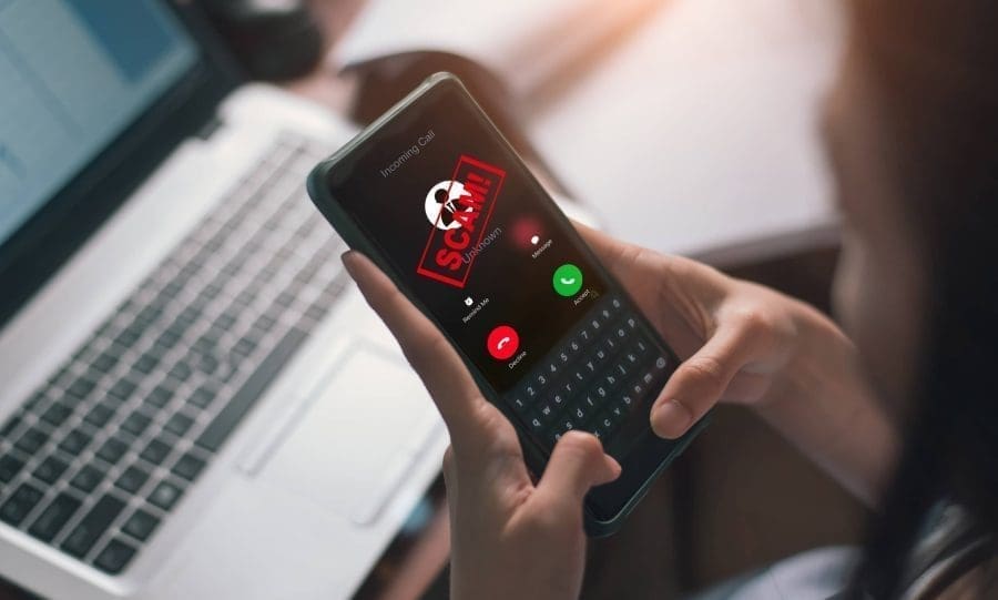 scam alert on mobile phone