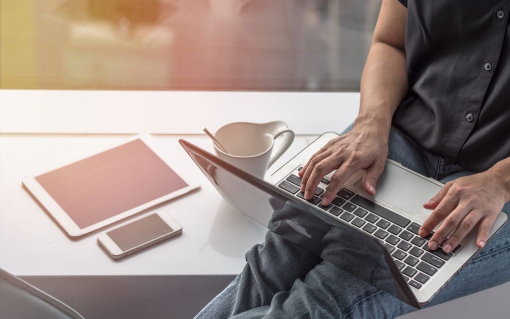 Man with multiple devices