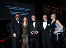 Philip Reitinger on stage at the 2026 Cyber Policy Awards being named Ecosystem Champion